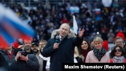 Владимир Путин во время митинг-концерта на стадионе «Лужники», 18 марта 2022 года
