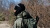 Ukraine -- Servicemen of 'Aydar' battalion rest during their training session on the shooting range near Perlyavka village, not far from Zhytomyr, April 9, 2015